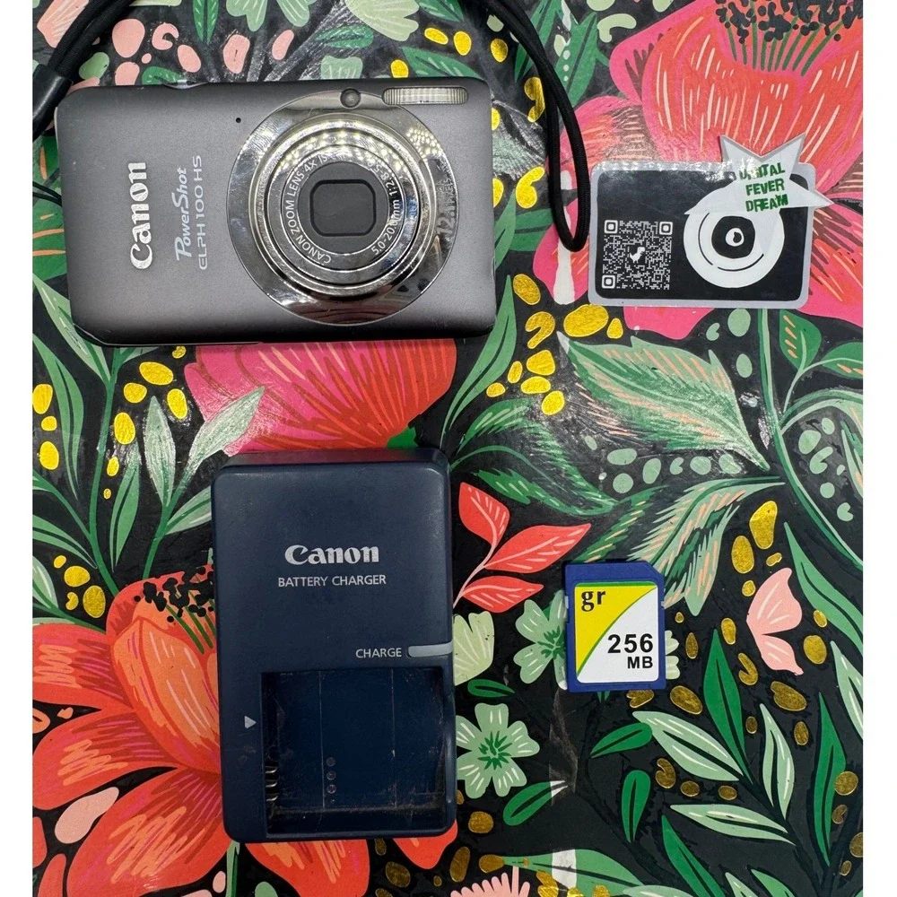 Canon PowerShot ELPH 100 HS 12.1MP Digital Camera Gray with Charger and Case